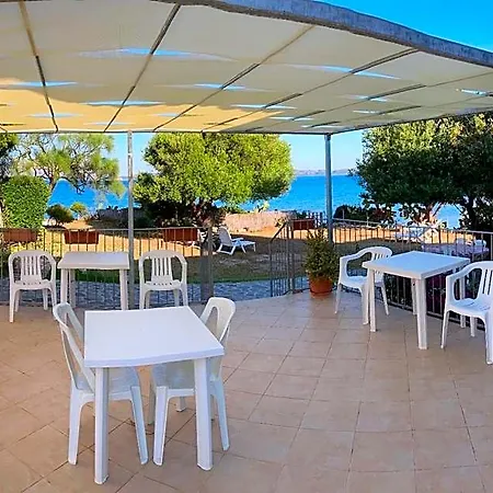 Punta Sirenella أولبيا